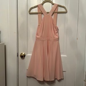 Light pink fit and flare dress.